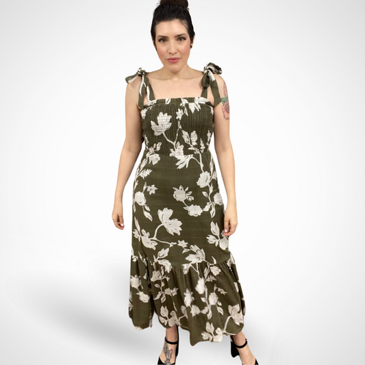 Jaboli Boutique - Fergus Ontario - Olive Green and Cream,  Sanctuary,  Plant Life Dress Floral print for a summery vibe. Square neckline and sleeveless design for warmer days, Playful tie straps,  Smocking detail on the bust for texture and fit enhancement. Made from comfortable cotton Pull-on construction for easy on and off.