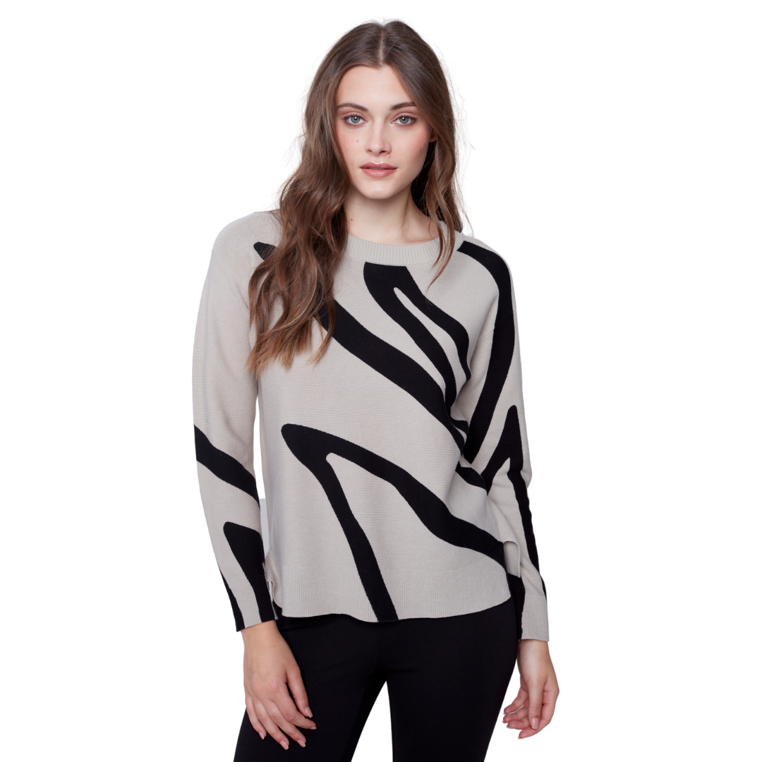 Jaboli Boutique - Fergus Ontario - Charlie B - Almond Jaquard Knit Sweater. A Nutral Abstract print sweater  Crew Neck  Colour - Almond with black accents   Jacquard Long Sleeve Pullover  Cotton  Perfect for a day at the office or and evening out layer under your fav coatigan, vest, or blazer.