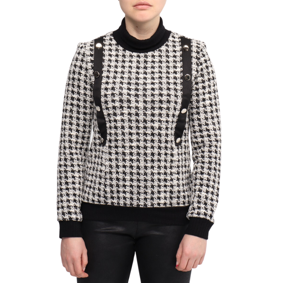 Jaboli Boutique - Fergus Ontario - Devia Houndstooth Knit Top. Colour - Black and White Combo  Relaxed Black Turtleneck  Black Pleather and Silver Button Detail on Front  Long Sleeves with Black Cuff  Hip Length with Black Knit Band  Proudly Made In Canada!