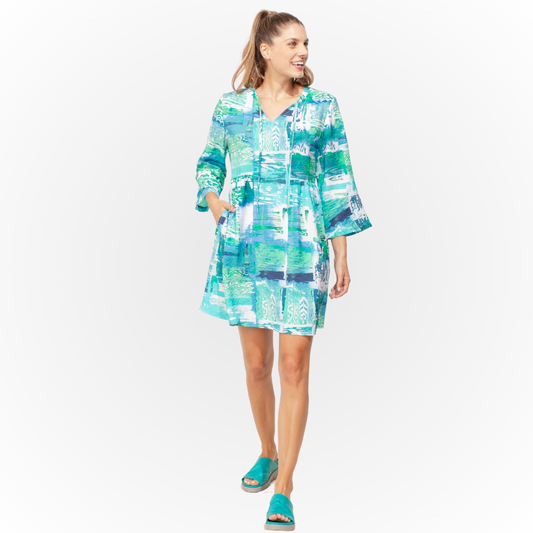 Jaboli Boutique - Fergus Ontario - Escape - Turquoise Seaside Dress. Henley Neckline with Tie  Colour - Turquoise Summer Surf Print  Relaxed Fit, Long Sleeves  Rayon/Tencel Blend  Cool, Lightweight, Comfortable  The Perfect little sundress.