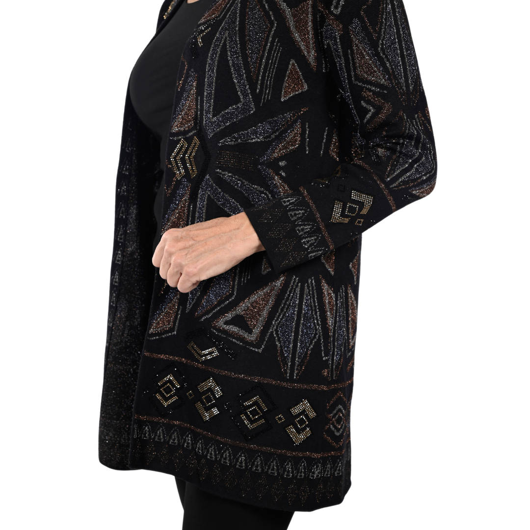Jaboli Boutique - Fergus Ontario - Frank Lyman - Jane Cardigan. A Black,rust, gold and charcoal print cardigan. Meet Jane A Geometric Print Knit Cardi Colours - Black/Rust with Gold and Bronze Accents Mid Thigh Length Long Sleeves Open Front A Stunning Cardigan That Goes Beautifully With All Your Fav Neutral Colours