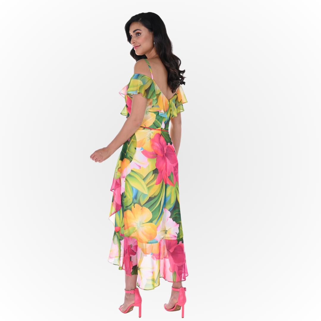  Jaboli Boutique - Fergus Ontario - Frank Lyman Tropical Sundress 246484. A fun flirty little dress with a gorgeous tropical hibiscus print. Ruffle Collar, Ruffle on or off the Shoulder, Colour Fuchsia/Green Tropical Print Sundress, Zipper Back, Jersey Lining to the Knee, Aline Skirt with Soft Diagonal Ruffle, Hi/Lo Hemline, Proudly Made in Canada!