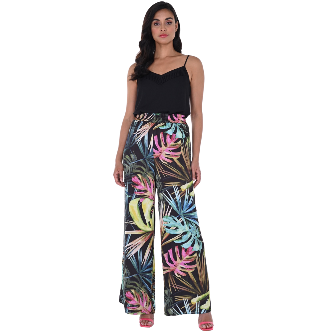 Jaboli Boutique - Fergus Ontario - Frank Lyman Tropical Palazzo Pants: Wide-leg print pants: Ideal for a stylish and comfortable getaway ensemble Vibrant colors: Fuchsia/Teal/Lime/Jade Tropical Print on a Black base Pull On Shirred Waistband: Ensures a chic appearance and maximum comfort Fully lined: Polished finish for added quality Proudly crafted in Canada: Reflecting craftsmanship and quality. Effortless blend: Perfect combination of comfort and style for your tropical retreat!