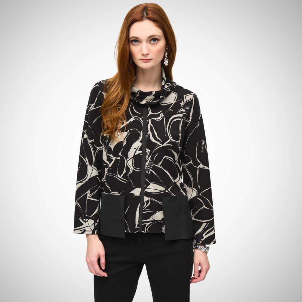 Jaboli Boutique - Fergus Ontario - Josepg Ribkoff - Black/Beige Boho Cowl Neck Top. Embrace a chic look with this abstract bohemian top from Joseph Ribkoff. Defined by a captivating cowl neck, it features long straight sleeves and exhibits a regular fit silhouette. This short-length top demonstrates elegance, exuding an intriguing blend of comfort and style to enhance your casual wardrobe effortlessly.     51% Viscose Rayon, 49% Polyester  Colour Black Base with Beige Print  Mock Neck  Long Sleeves