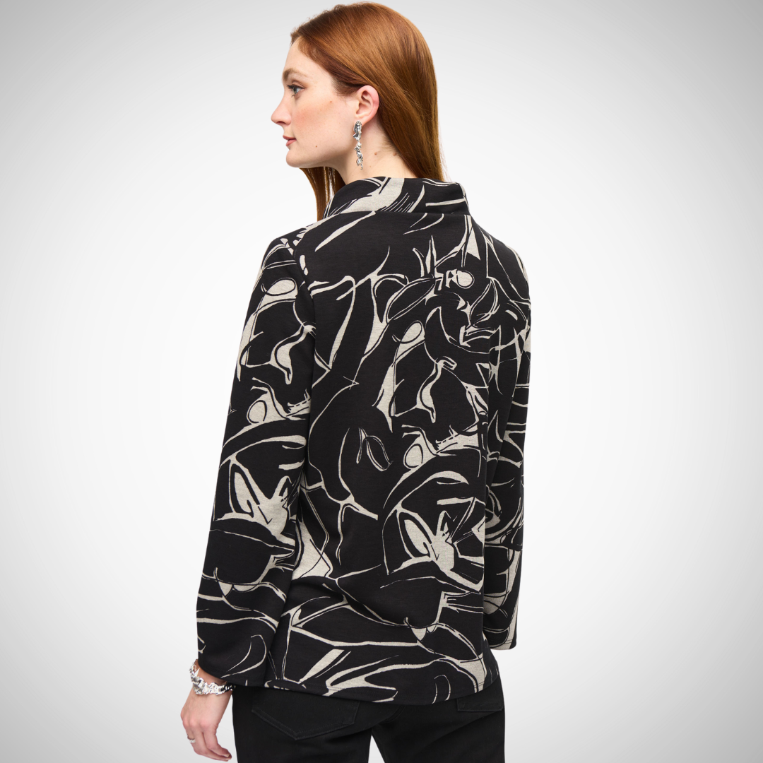 Jaboli Boutique - Fergus Ontario - Josepg Ribkoff - Black/Beige Boho Cowl Neck Top. Embrace a chic look with this abstract bohemian top from Joseph Ribkoff. Defined by a captivating cowl neck, it features long straight sleeves and exhibits a regular fit silhouette. This short-length top demonstrates elegance, exuding an intriguing blend of comfort and style to enhance your casual wardrobe effortlessly.     51% Viscose Rayon, 49% Polyester  Colour Black Base with Beige Print  Mock Neck  Long Sleeves