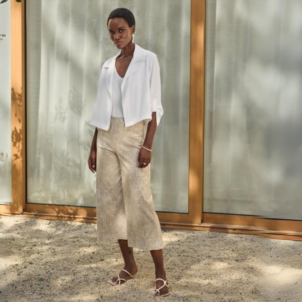 Jaboli Boutique - Fergus Ontario - Joseph Ribkoff - Cropped Vanilla Jacket , Style # 242059, Meet the Cropped Vanilla Jacket, a summer essential from Joseph Ribkoff. This open-front jacket features a relaxed shape, ideal for completing any outfit. Notched lapels and rolled tab cuffs add a polished, preppy touch to your look. Crafted from 100% polyester