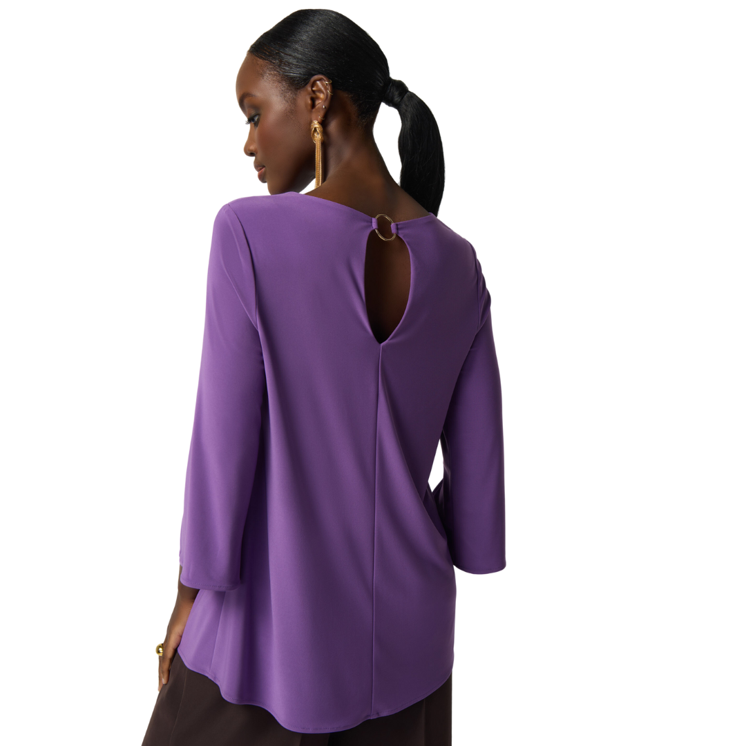 Jaboli Boutique -Fergus Ontario - Joseph Ribkoff Keyhole Neckline Tunic. Signature Jersey Fabric, Neckline has unique Gold Ring Accent, (front and back) Colours - Violet, Nightfall, 3/4 Sleeve Relaxed Fit, Classic Profile Proudly Made In Canada!