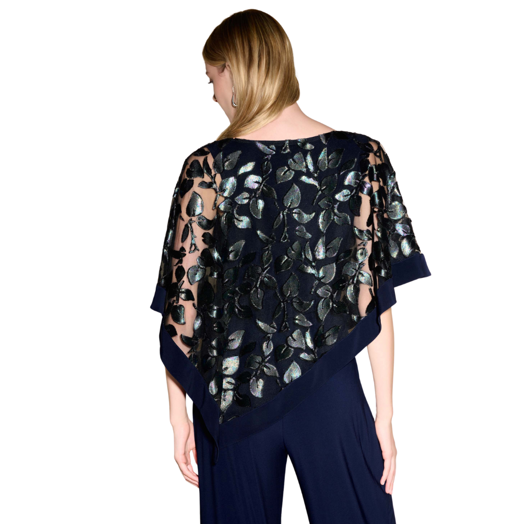 Jaboli Boutique - Fergus Ontario - Joseph Ribkoff - laser cut overlay top. Leaf Motif, So unique and stunning the perfect top for a mother/grandmother of the bride/groomMidnight Blue Sheer Cape Top with Leaf Motif Throughout Fully Lined with Midnight Blue Tank Pair with Coordinating Pull On Palazzo Pants For a Great Special Event Outfit Proudly made in Canada!