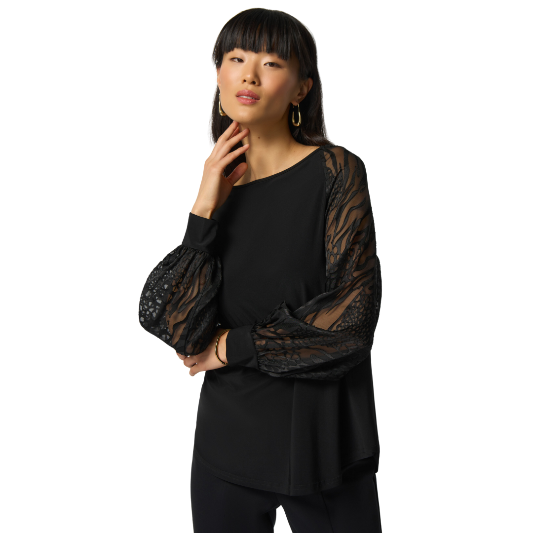Jaboli Boutique, Fergus Ontario, Joseph Ribkoff - Party Blouse style # 233003, Col Black, Boat neckline.Meet the Fabulous Jersey/Chiffon Black Dressy Blouse, a captivating addition to your wardrobe. Proudly crafted in Canada, this blouse offers comfort and style. The hip-length cut adds a touch of chicness, making it suitable for any occasion. Long mesh and lace sleeves with a jersey cuff create a sophisticated contrast with a hint of allure.