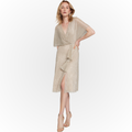 Jaboli Boutique - Fergus Ontario - Joseph Ribkoff Champagne Cocktail Dress.  Champagne Shimmer Dress,  Cape Shoulder with Faux Wrap Detail,  Jewelled accent at waist anchors Vertical Ruffle creates a sliming effect,  Cocktail Length,  Perfect Mother of the Bride/Groom Dress,  Proudly Made In Canada! 