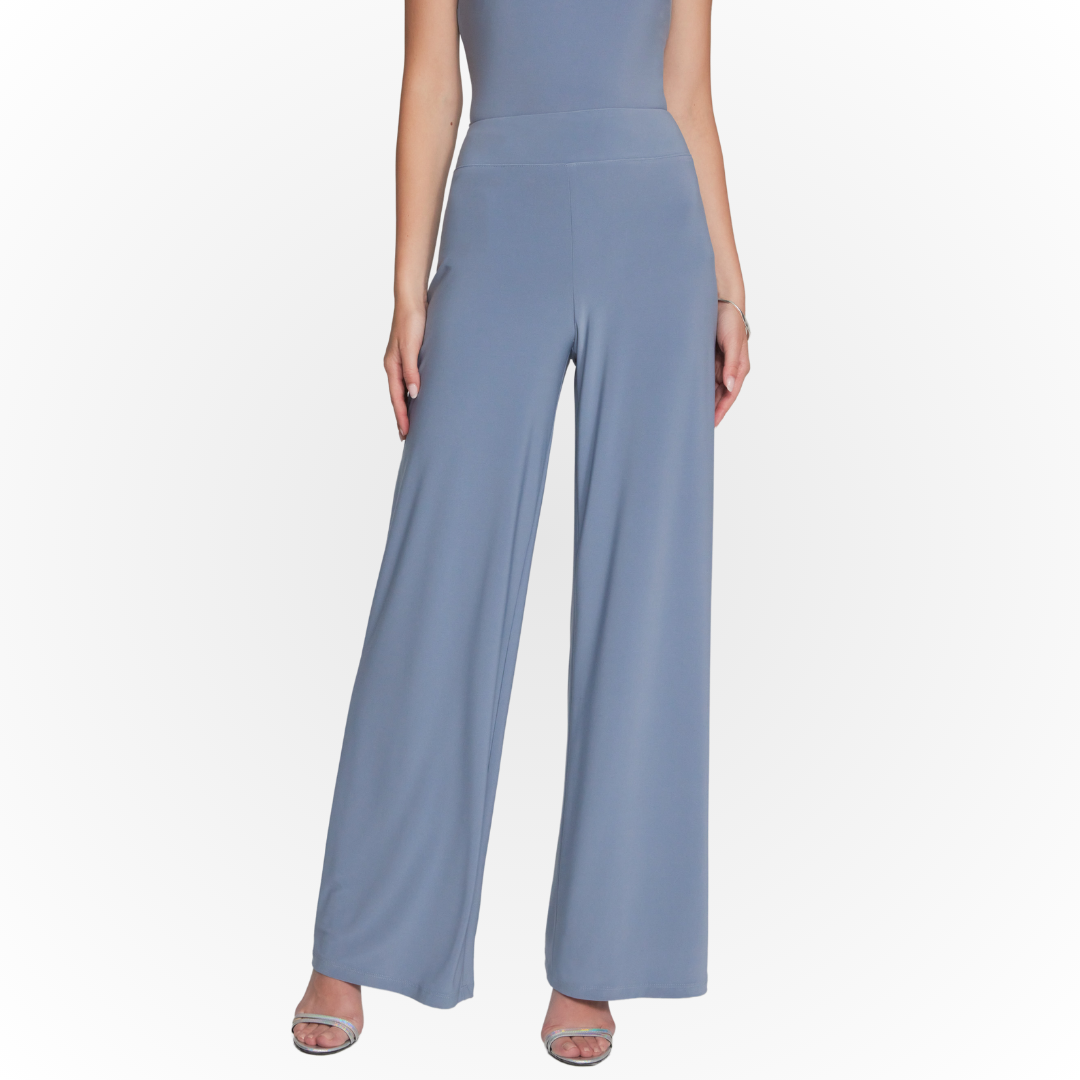 Jaboli Boutique - Fergus Ontario - Joseph Ribkoff Jersey Wide Leg Pant 221340, Serenity Blue Pull-on style, High-rise design for a flattering silhouette, Midnight blue and serenity blue colors for versatility, Wide leg and relaxed fit for unrestricted movement, Proudly crafted in Canada, Effortlessly combines comfort and sophistication, A must-have for the fashion-forward individual.