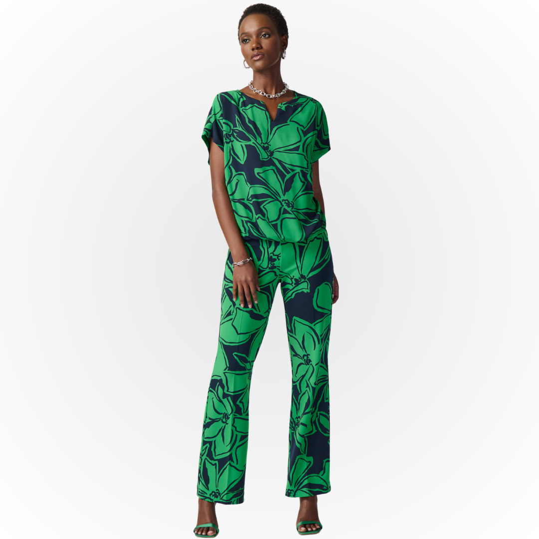 Jaboli Boutique - Fergus Ontario - Joseph Ribkoff Midnight/Green Tropical Top 241059 Notched neckline  Colour - Midnight Blue/Green Tropical Print  Relaxed Fit  Cap Sleeve  Light Weight Crepe Fabric with jersey Lined Front  Gathered hem in Front, Longer in the Back  Proudly Made in Canada!  Pair with Coordinating Palazzo Pants for a Great Holiday Outfit!