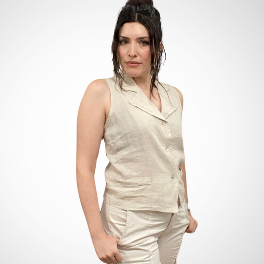 Jaboli Boutique - Fergus Ontario - Pistache - Vest. Pistache Linen Vest: Button-front design, tuxedo collar Versatile natural hue Can be worn as a layer over tee, dress, or blouse Alternatively styled as a sleeveless shirt Chic ensemble with linen pants Timeless and adaptable