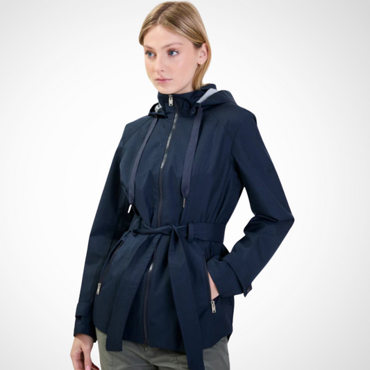  Jaboli Boutique - Fergus Ontario - Point Zero - Belted Rain Jacket. Elevate your rainy day wardrobe with our Belted Rain Jacket in timeless navy. Stay protected from the elements while remaining stylish with this practical yet fashion-forward jacket. The adjustable belt offers a personalized fit and adds an elegant touch to your outfit. Seamlessly merging fashion and function, this rain jacket is a must-have. Don't compromise on style when the weather acts up – make a statement with our Belted Rain Jacket.