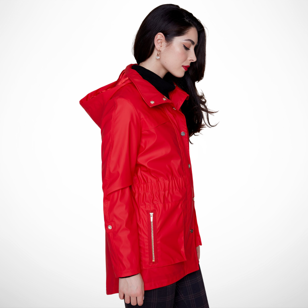Jaboli Boutique - Fergus Ontario - Renuar - All Weather Coat - Colour Berry (True Red). Fashionable and functional waterproof raincoat
Ideal for walking the dog or running errands
Cinched waist detail for a flattering silhouette
Hidden hood in the collar for weather readiness
Available in crème, berry, and black
Long sleeves and convenient pockets
32-inch center back length
Made from a durable 50% PU and 50% polyester blend
Must-have addition to your outerwear collection
