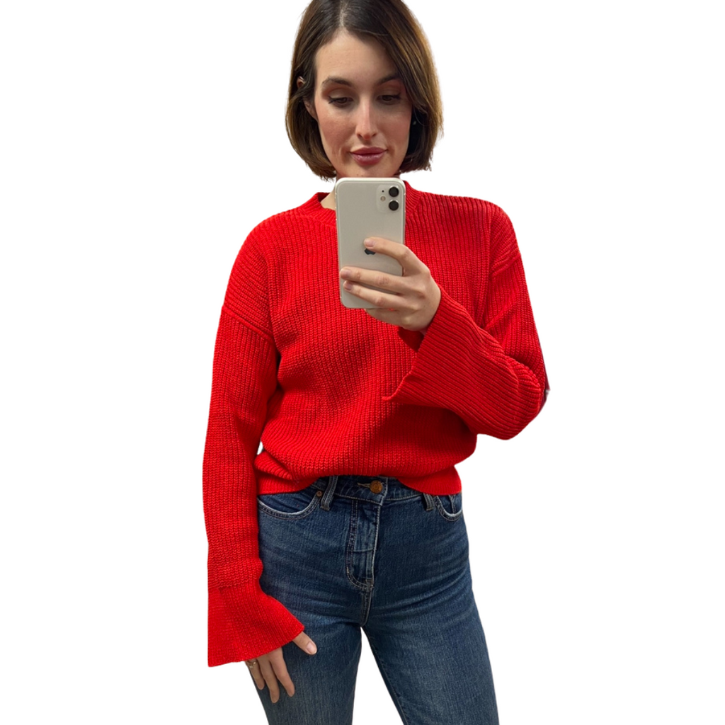 Jaboli Boutique - Fergus Ontario - Sanctuary -Chilly Out Sweater: Festive and cheerful addition to your wardrobe Cozy chenille sweater with a comfortable crew neck Vibrant lipstick color for a pop of warmth and vibrancy Long sleeves and waist-length design for a balanced blend of comfort and style Versatile option, perfect for pairing with your favorite Shirt Tail Blouse Ideal for creating a chic and fashionable look for any occasion Embrace the season in style with the Chilly Out Sweater.