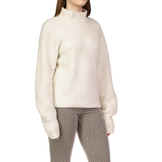 Jaboli Boutique - Fergus Ontario - Honeycomb Sleeve Sweater: Perfect blend of style and comfort Mock neck with a cozy collar for warmth and fashion Delightful Toasted Marshmallow (Ivory) hue for elegance Honeycomb sleeves add a unique texture and showcase craftsmanship Hip-length design strikes a balance between modern flair and casual comfort Versatile and must-have piece for your wardrobe
