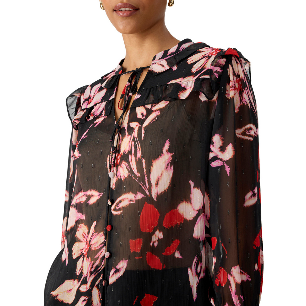 Jaboli Boutique - Fergus Ontario - Sanctuary - Winter Wish Blouse. Winter Wish Blouse: Perfect for your holiday style. Adorned with a stunning poinsettia print for a festive touch of color. Features a charming ruffle collar in a classic Black with Pink and Red Print. Button-front design for a classic and practical element. Long sleeves with ruched cuffs add sophistication to the look. Ideal for holiday parties and special occasions.