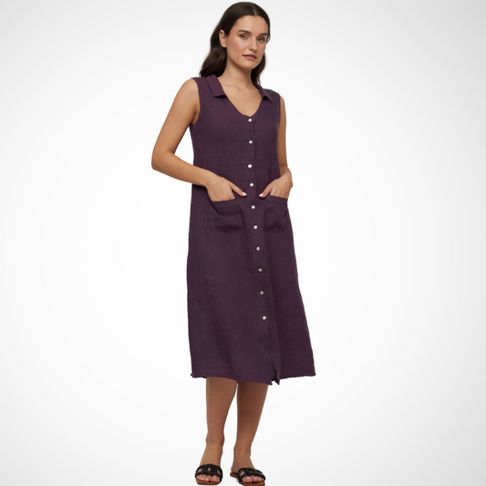 Jaboli Boutique - Fergus Ontario - Pistache - Violet Midi Dress - Linen - Get ready for some summer fun in the Pistache Violet Midi Dress! This playful midi dress features a collared neckline, V-neck, and front button closure, as well as front patch pockets for added convenience. And let's not forget the stunning deep violet colour that will make you stand out in any crowd.
