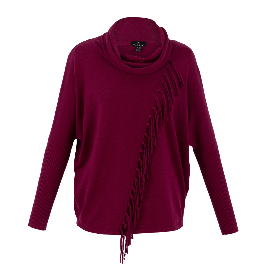 Jaboli Boutique - Fergus Ontario - Marble - Diagonal Fringe Pullover.  A Fan Favourite At Jaboli ( all the employees own one) we recommend sizing down in this garment. A fashion forward versitile sweater made to last.  Finely Knit cotton Relaxed Cowl Pullover  Colour - Berry  Luxury Feel 100% Cotton  Oversized Fit  Diagonal Line of Matching Fringe from Shoulder to Hip  Proudly Made In Scotland!