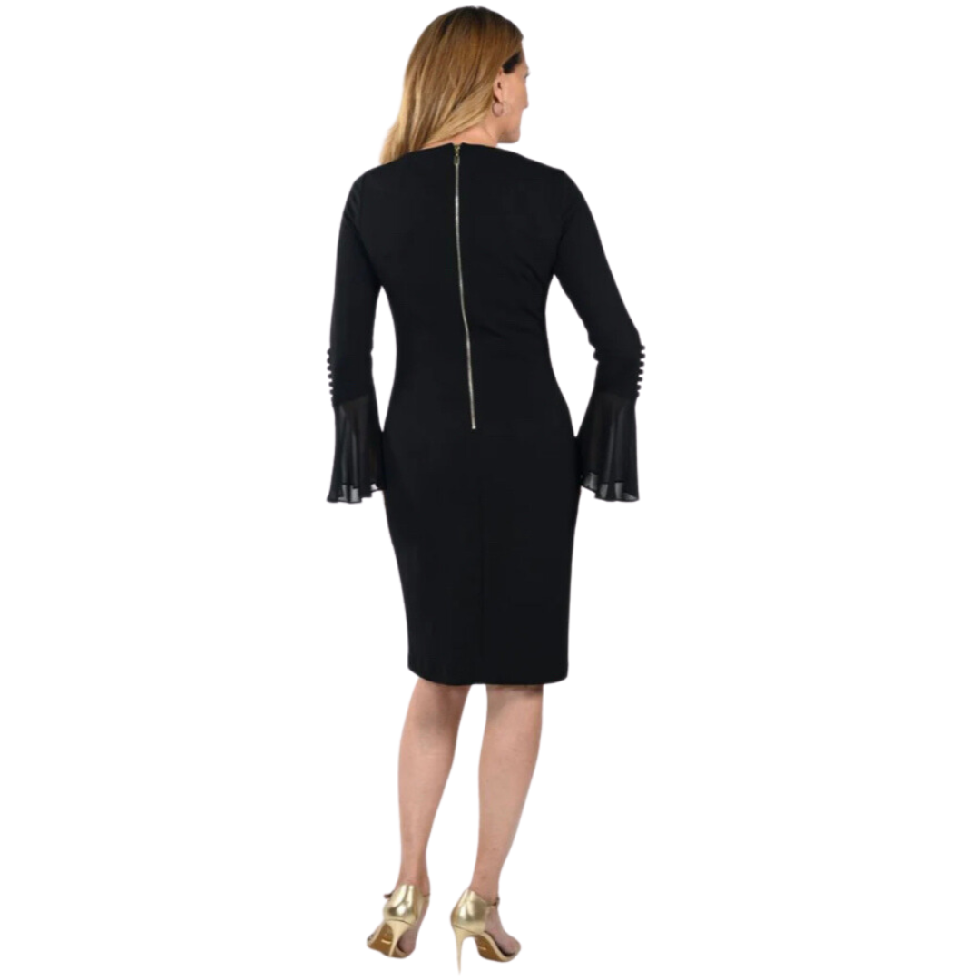 Jaboli Boutique - Fergus ontario - Frank Lyman Black Party Dress. A Classic with a fun twist to the sleeves. A gorgeous little black dress. A Boat Neckline Colour - Black Crepe Jersey (Stretch) Fitted Long Sleeves with Ruffle Cuff and Button Accent Knee Length Proudly Made In Canada!