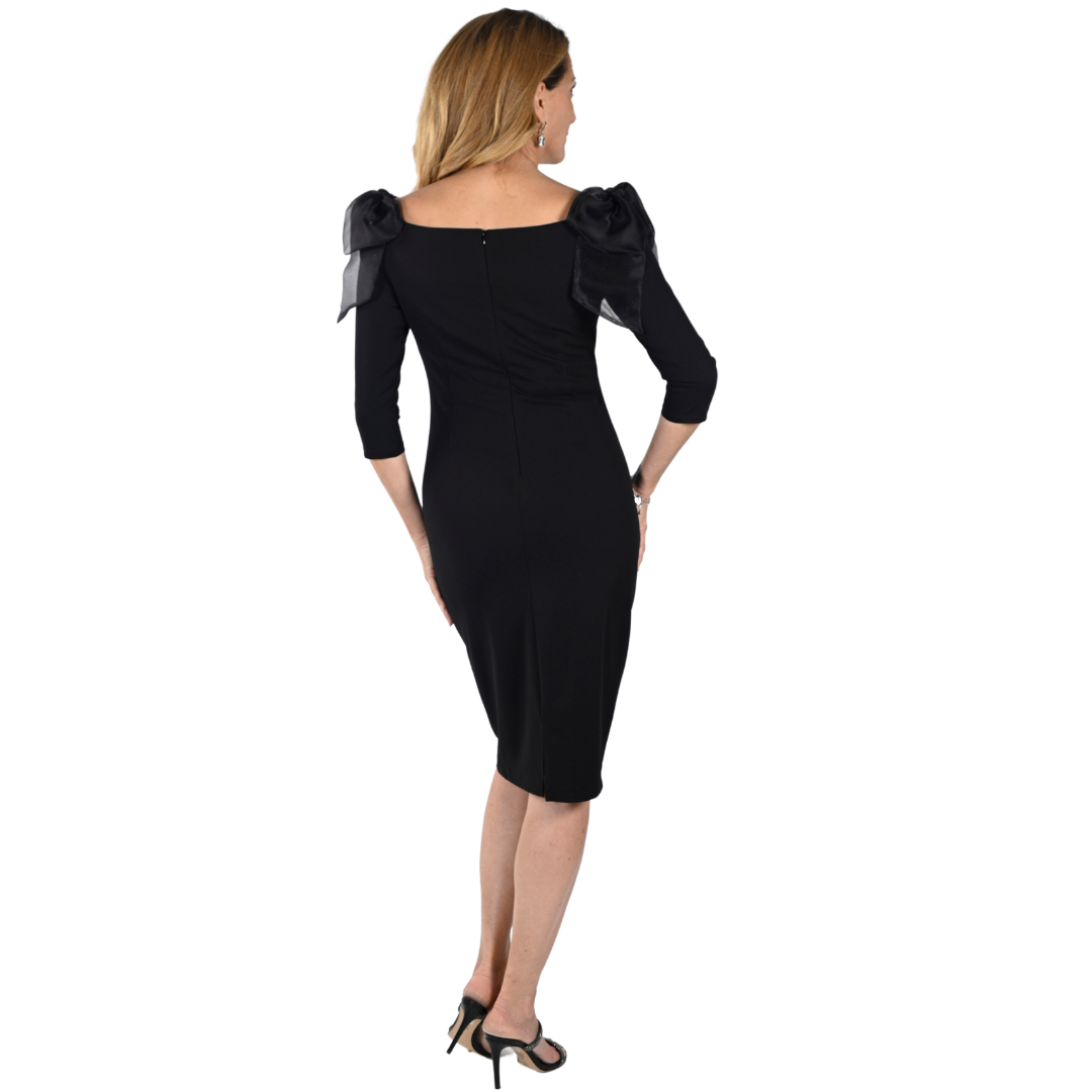JaboliBoutique-FergusOntario-Franklyman-BlackBowDress. A Dress that gives us old hollywood glam vibes wear on or off shoulder with a beautiful bow sleave detail. Boat Neckline Jersey Crepe Fabric, Fully Lined 3/4 Sleeve with Organza Bow Detail at Shoulder Fitted Body Proudly Made In Canada!