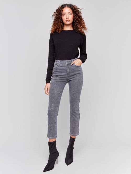 Jaboli Boutique- Fergus Ontario-Charlie B - Studded Grey Jean- Style #C5558 417B-168

Medium-grey with front sparkle studs
Regular rise and slim leg for a flattering fit
Super soft stretch denim for comfort
Cropped length, ideal for styling with booties
Classic 5-pocket styling with fly front
Made from 74% cotton, 23% nylon, 3% spandex
Practical and stylish with a touch of glamour