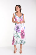 Jaboli Boutique-Fergus Ontario-Frank Lyman-Floral Party Dress-242319U.
Stunning floral print dress with vibrant floral and leaf pattern
Fresh white background for a bright, summery look
Sweetheart neckline for classic elegance
Midi-length silhouette perfect for any occasion
Sleeveless design for cool comfort on hot days
Flowy, pleated skirt for effortless movement
Blends style and practicality for chic, summery charm
Ideal for adding graceful sophistication to your wardrobe