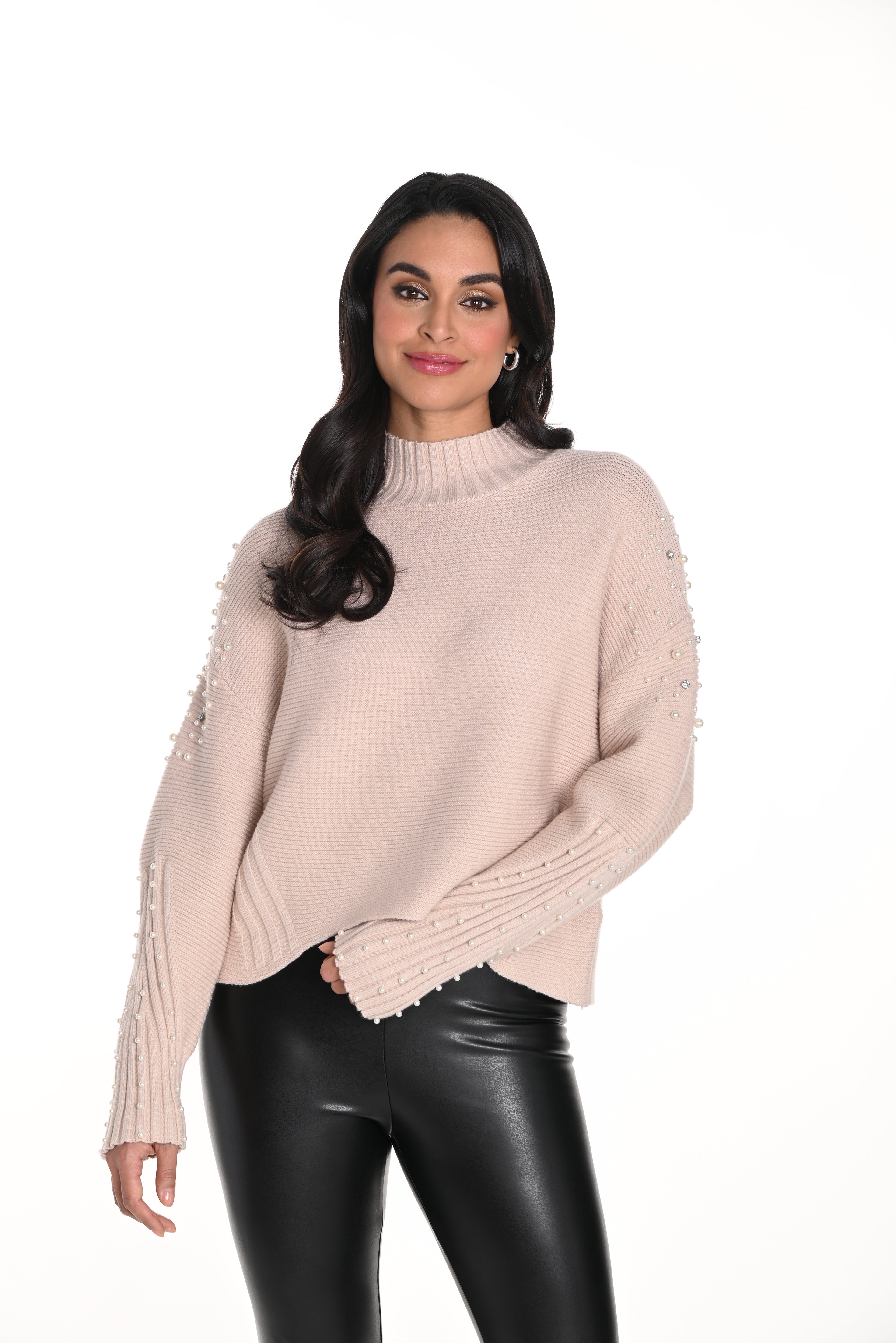 Jaboli Boutique-Fergus Ontario-Frank Lyman Pearl/Beige Sweater.
Chic beige mock neckline sweater
Stunning pearl accents on shoulders and sleeves
Timeless neutral color complements any outfit
Hip-length design with flattering hi-low hem
Ribbed knit for extra warmth and texture
Cozy, relaxed fit for comfortable wear
Elegant high neckline for added style
Versatile for dressing up or casual wear
100% Polyester,
drop shoulders 





