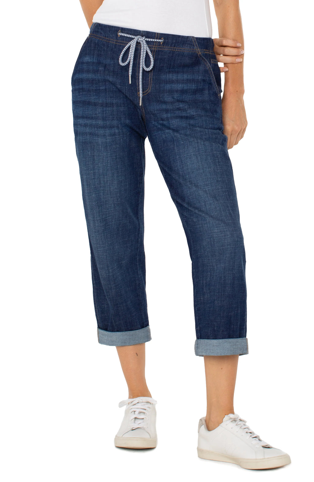 Jaboli Boutique-Fergus Ontario-Liverpool- Rascal Jean-relaxed-fit cargo pants in a soft  woven Gabriel Blue(dark indigo), featuring a pull-on design with an elastic waistband, belt loops, and adjustable drawstring waist. Pants have four utility-style pockets, subtle stitch detailing, and a low-rise silhouette. Shown rolled at 24" inseam, with an option for full 27" length. Made from breathable 100% cotton, offering a roomy fit through the hips and thighs. 