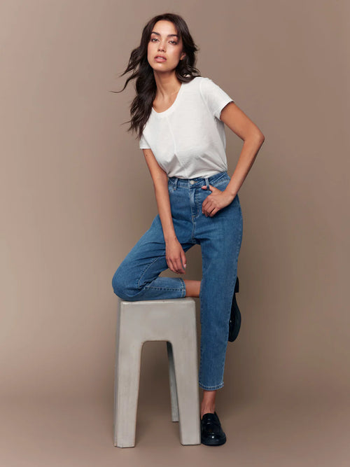 Jaboli_Boutique-_Fergus_Ont-Charlie_B_Claudia_Slim_Leg_Jean_Medium_Blue_Wash-S25-1
Slim leg cut for a sleek, flattering silhouette
– Medium blue wash for timeless appeal
– Ankle-length design ideal for transitional styling
– Classic five-pocket construction
– Stretch denim for comfort and flexibility
– Regular rise for a balanced, natural fit

these jeans hug in all the right places  offering movement and breathability. The slim leg tapers neatly at the ankle, perfect for showcasing your favourite shoes.