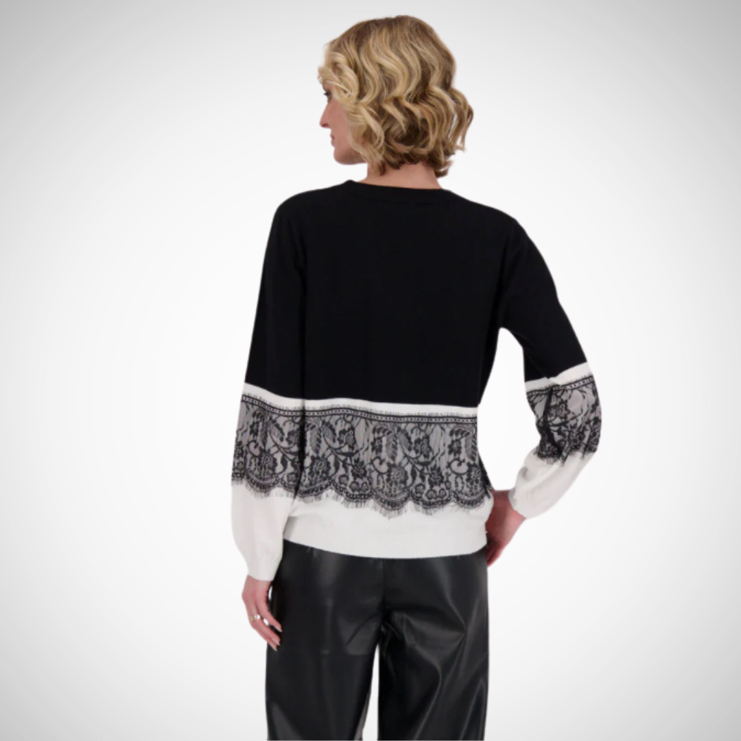 Jaboli Boutique- Fergus Ontario-Gabby Isabella Lace Panel Sweater
Chic contrast lace panel design
Soft, finely knit texture
Classic crew neck
Black color with white panel and black lace details on body and sleeves
Hip-length for a versatile, flattering fit
Composition: 50% viscose, 27% polyester, 23% nylon for softness and comfort