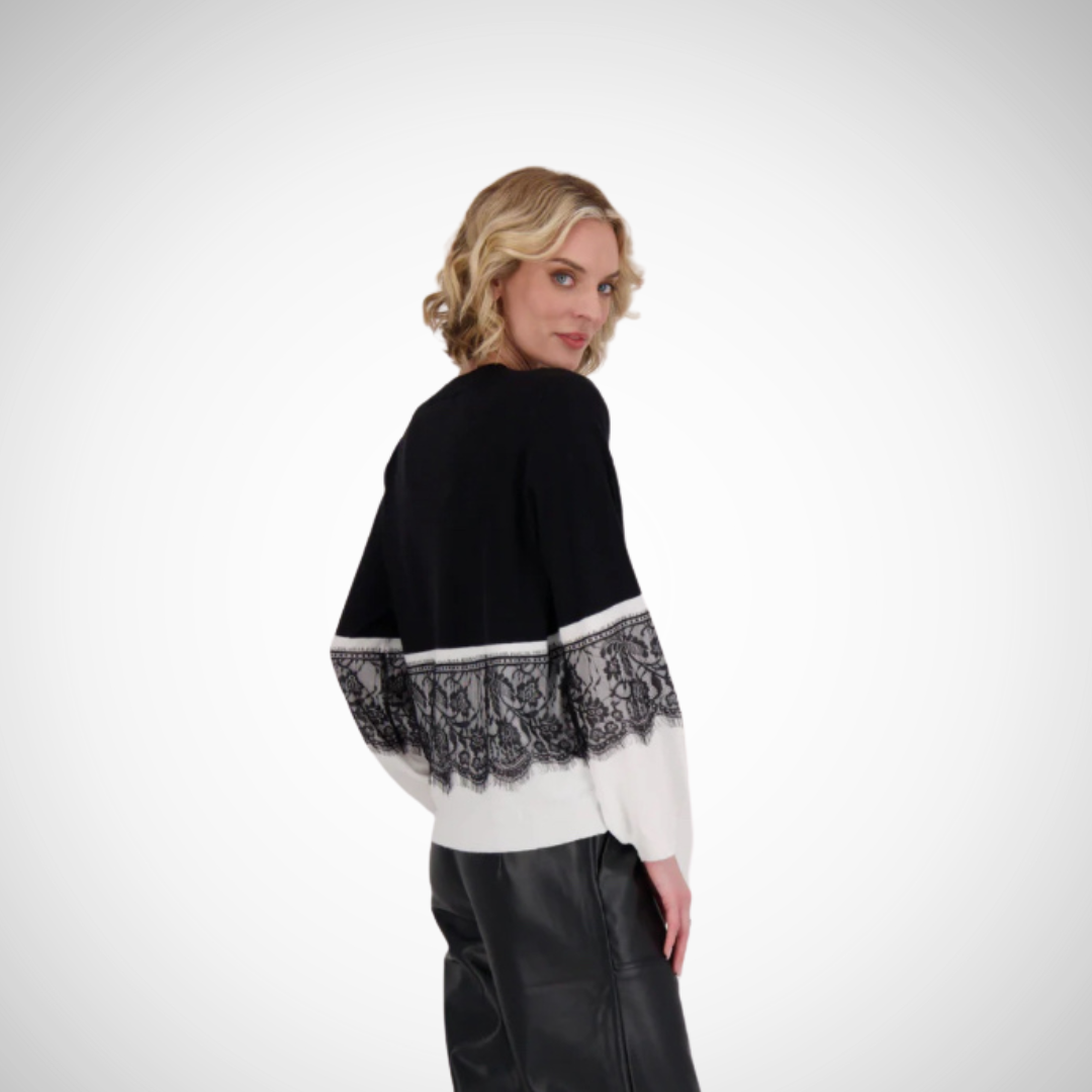 Jaboli Boutique- Fergus Ontario-Gabby Isabella Lace Panel Sweater
Chic contrast lace panel design
Soft, finely knit texture
Classic crew neck
Black color with white panel and black lace details on body and sleeves
Hip-length for a versatile, flattering fit
Composition: 50% viscose, 27% polyester, 23% nylon for softness and comfort