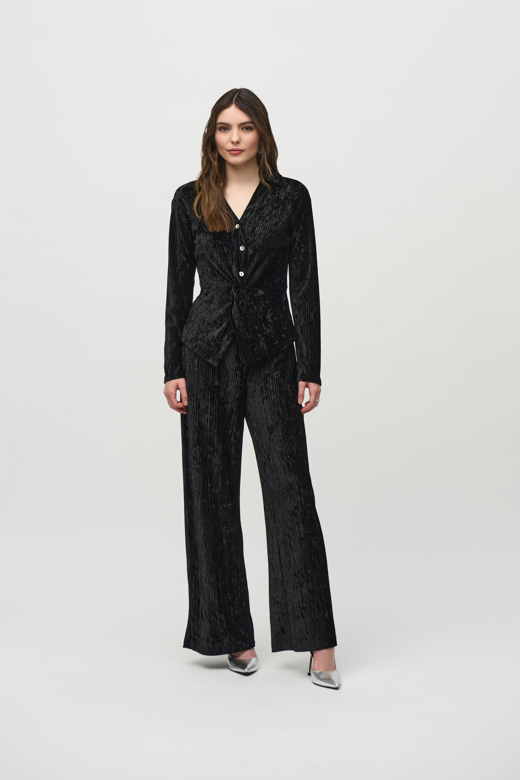 Jaboli Boutique- Fergus Ontario-Joseph Ribkoff Crushed Velvet Party Top
 Style # 244156
Flattering V-neckline
Black color
Long sleeves with faux button closure
Peplum front for a chic, waist-length look
Perfect for casual, semi-formal, or evening events
92% Polyester, 8% Spandex