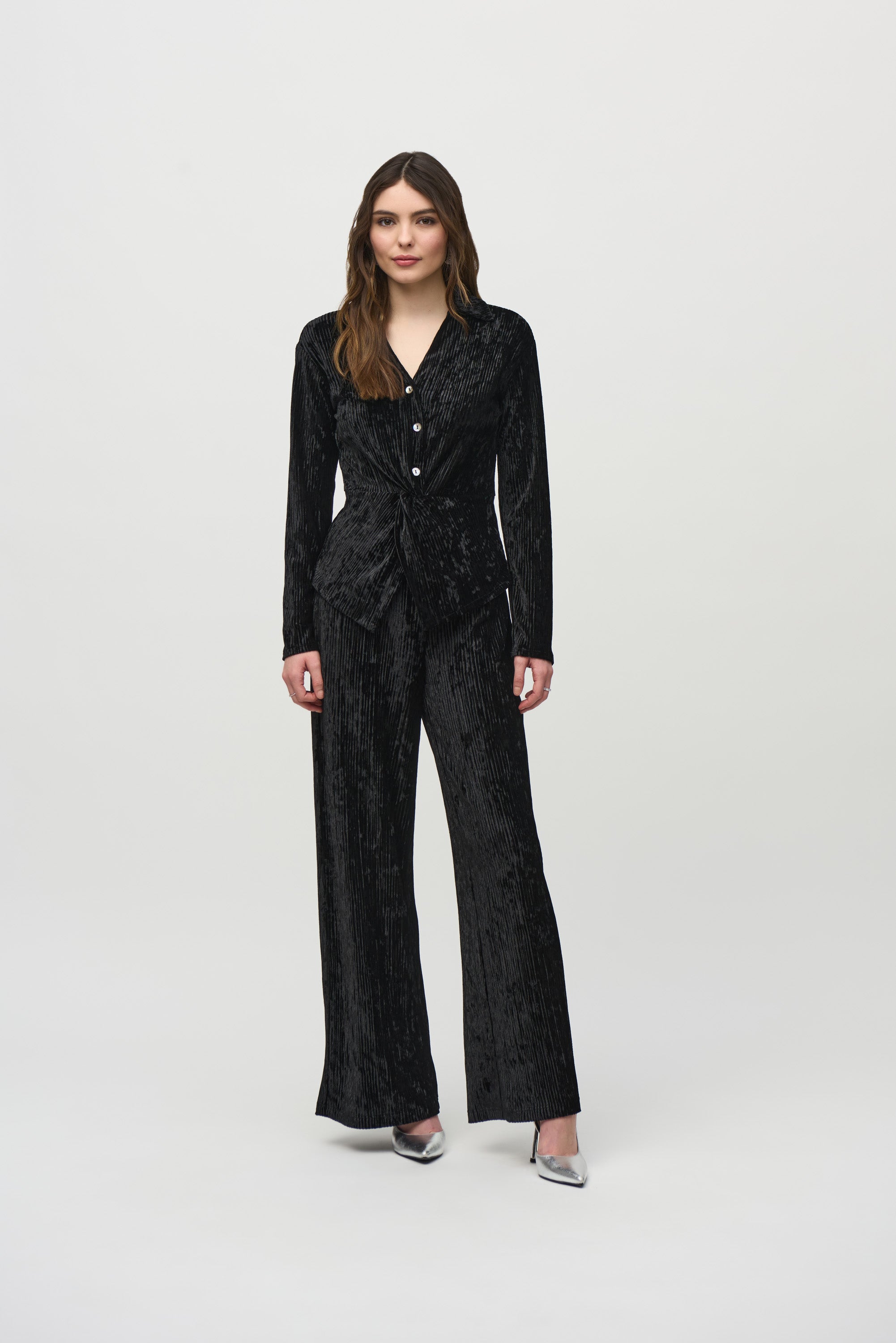 Jaboli Boutique- Fergus Ontario-Joseph Ribkoff Crushed Velvet Party Top
 Style # 244156
Flattering V-neckline
Black color
Long sleeves with faux button closure
Peplum front for a chic, waist-length look
Perfect for casual, semi-formal, or evening events
92% Polyester, 8% Spandex