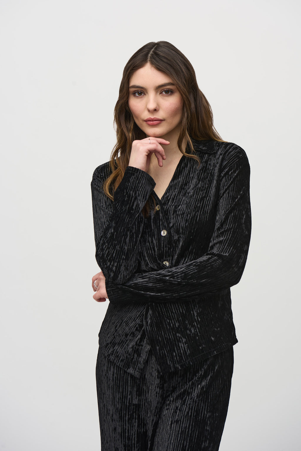 Jaboli Boutique- Fergus Ontario-Joseph Ribkoff Crushed Velvet Party Top
 Style # 244156
Flattering V-neckline
Black color
Long sleeves with faux button closure
Peplum front for a chic, waist-length look
Perfect for casual, semi-formal, or evening events
92% Polyester, 8% Spandex