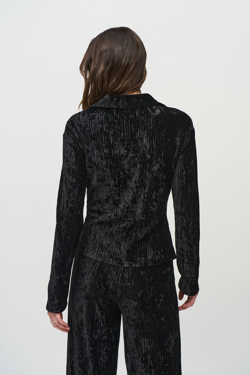 Jaboli Boutique- Fergus Ontario-Joseph Ribkoff Crushed Velvet Party Top
 Style # 244156
Flattering V-neckline
Black color
Long sleeves with faux button closure
Peplum front for a chic, waist-length look
Perfect for casual, semi-formal, or evening events
92% Polyester, 8% Spandex