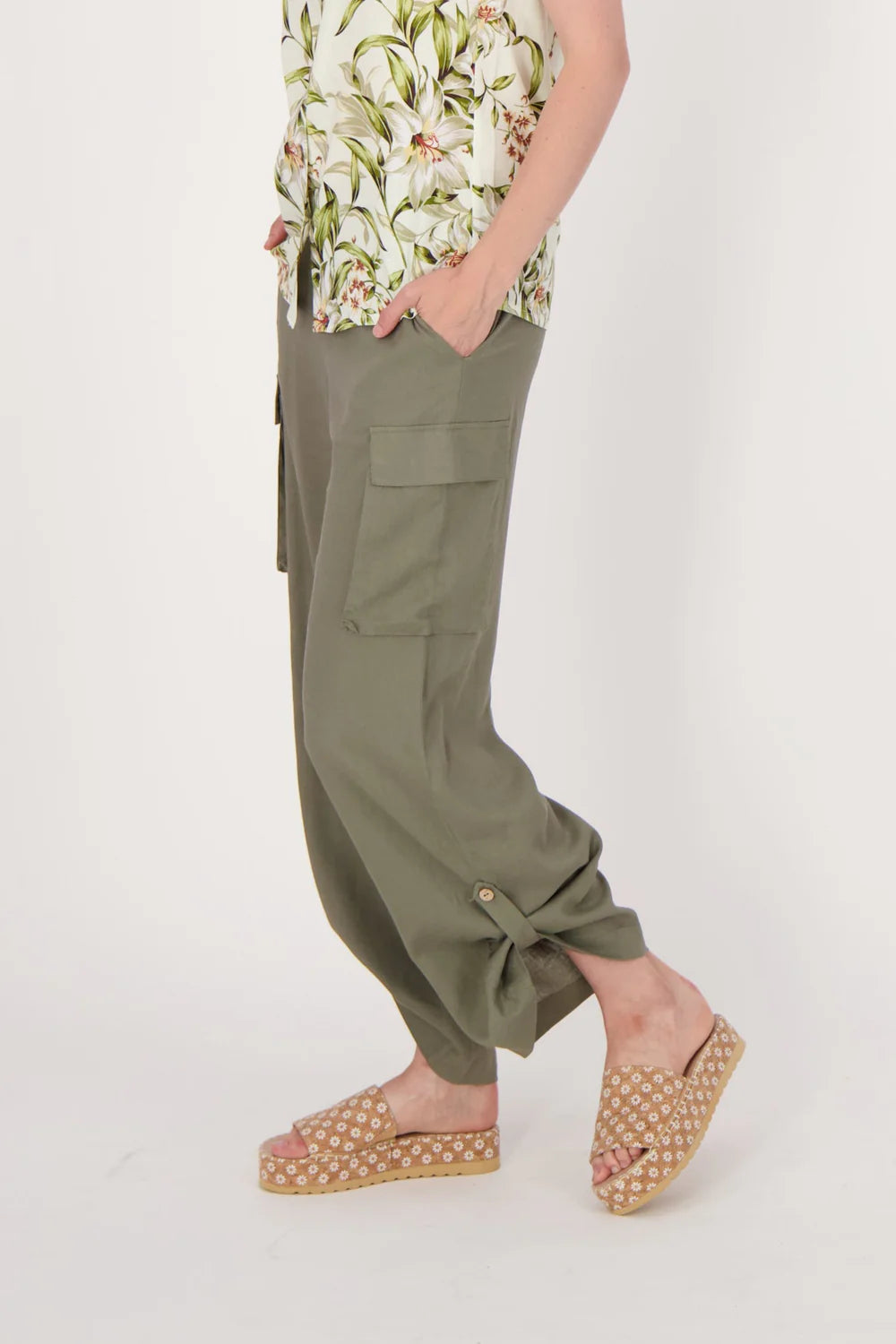 Jaboli Boutique- Fergus Ontario-Spanner - wide leg cargo pant. Olive green wide leg cargo pants with a relaxed fit, made from a lightweight rayon-linen blend. Features an elastic pull-on waistband, four pockets, and adjustable tab-up hems at the ankles.