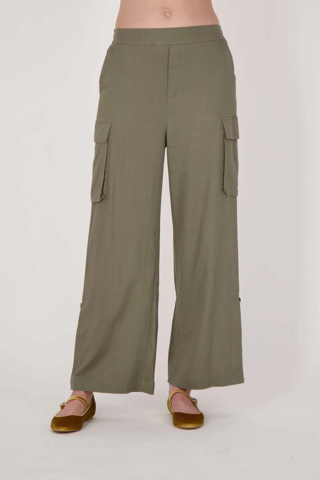 Jaboli Boutique- Fergus Ontario-Spanner - wide leg cargo pant. Olive green wide leg cargo pants with a relaxed fit, made from a lightweight rayon-linen blend. Features an elastic pull-on waistband, four pockets, and adjustable tab-up hems at the ankles.