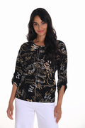 Jaboli_Boutique-_Fergus_Ontario-Frank Lyman Black & Beige Print Top – A stylish and versatile blouse featuring a bold black base with an abstract white and beige print. Designed with a classic crew neckline, relaxed fit, and elbow-length sleeves with a chic tab-up detail. A single offset pocket adds subtle visual interest. Perfect for effortless styling, whether paired with the matching jacket for a coordinated set or dressed up with black trousers for a polished, formal look.