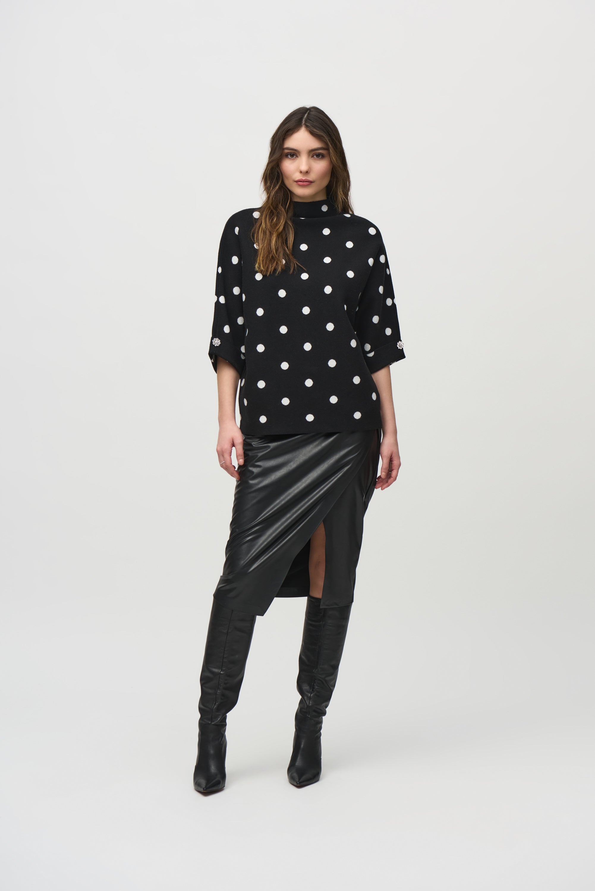 Jaboli Boutique- Fergus Ontario - Joseph Ribkoff- Holiday Dot Sweater.
Chic funnel neck pullover by Joseph Ribkoff
Black base with white polka dots
Relaxed, hip-length fit
Luxurious jacquard sweater fabric
Elbow-length sleeves with jeweled button accents
Perfect for casual or dressy occasions
54% Viscose Rayon, 31% Polyester, 15% Nylon