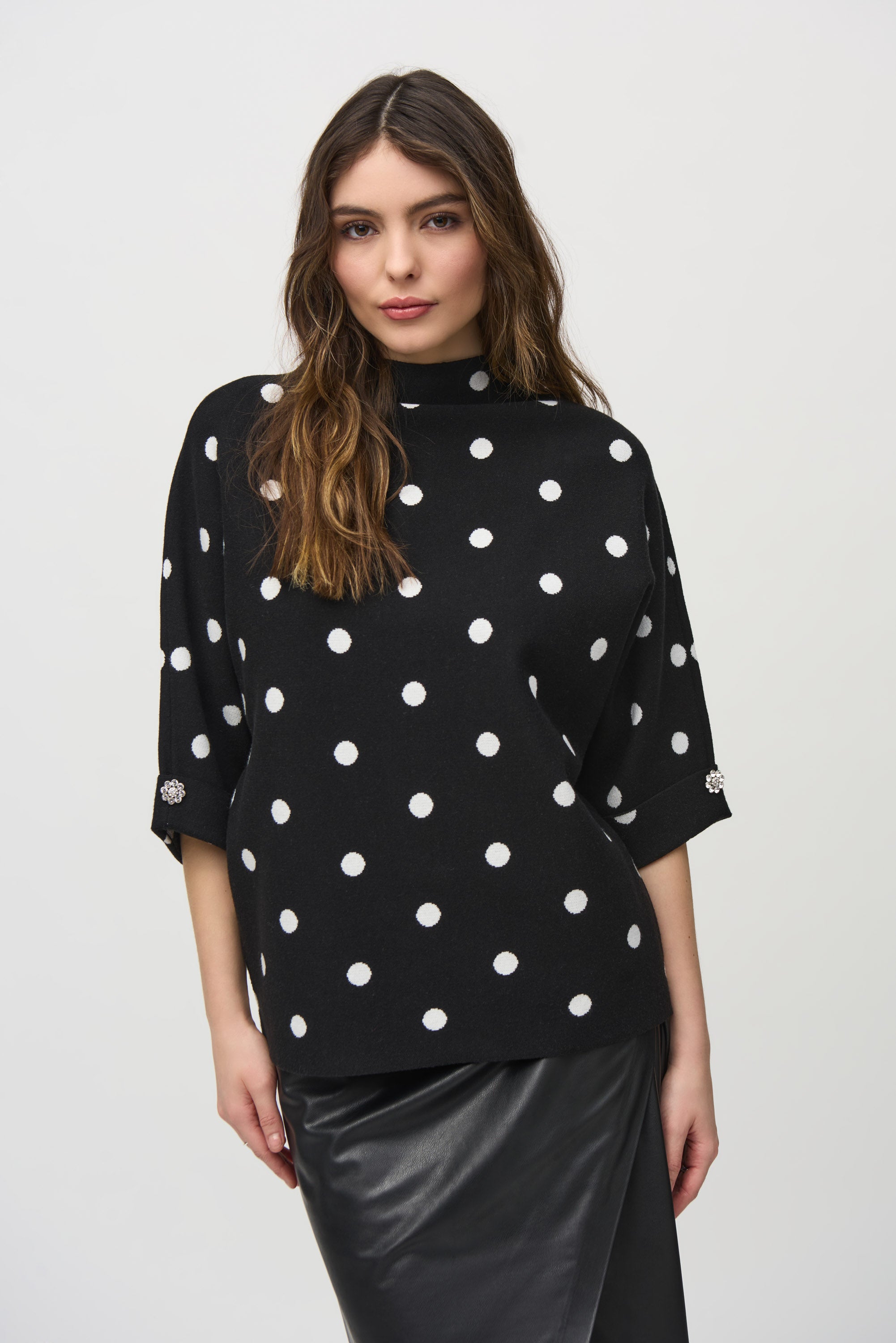 Jaboli Boutique- Fergus Ontario - Joseph Ribkoff- Holiday Dot Sweater.
Chic funnel neck pullover by Joseph Ribkoff
Black base with white polka dots
Relaxed, hip-length fit
Luxurious jacquard sweater fabric
Elbow-length sleeves with jeweled button accents
Perfect for casual or dressy occasions
54% Viscose Rayon, 31% Polyester, 15% Nylon