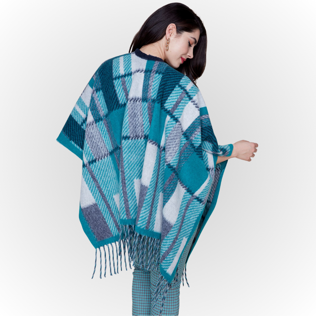 Jaboli Boutique-Fergus Ontario-Renuar-Plaid Poncho - Peacock Plaid Poncho for fall Brushed knit plaid print Tan and peacock color combos Fringe hem detail Open front design Made from 100% acrylic One size fits most Stylish and cozy for crisp autumn days
