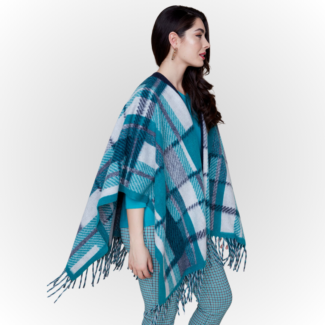 Jaboli Boutique-Fergus Ontario-Renuar-Plaid Poncho - Peacock Plaid Poncho for fall Brushed knit plaid print Tan and peacock color combos Fringe hem detail Open front design Made from 100% acrylic One size fits most Stylish and cozy for crisp autumn days