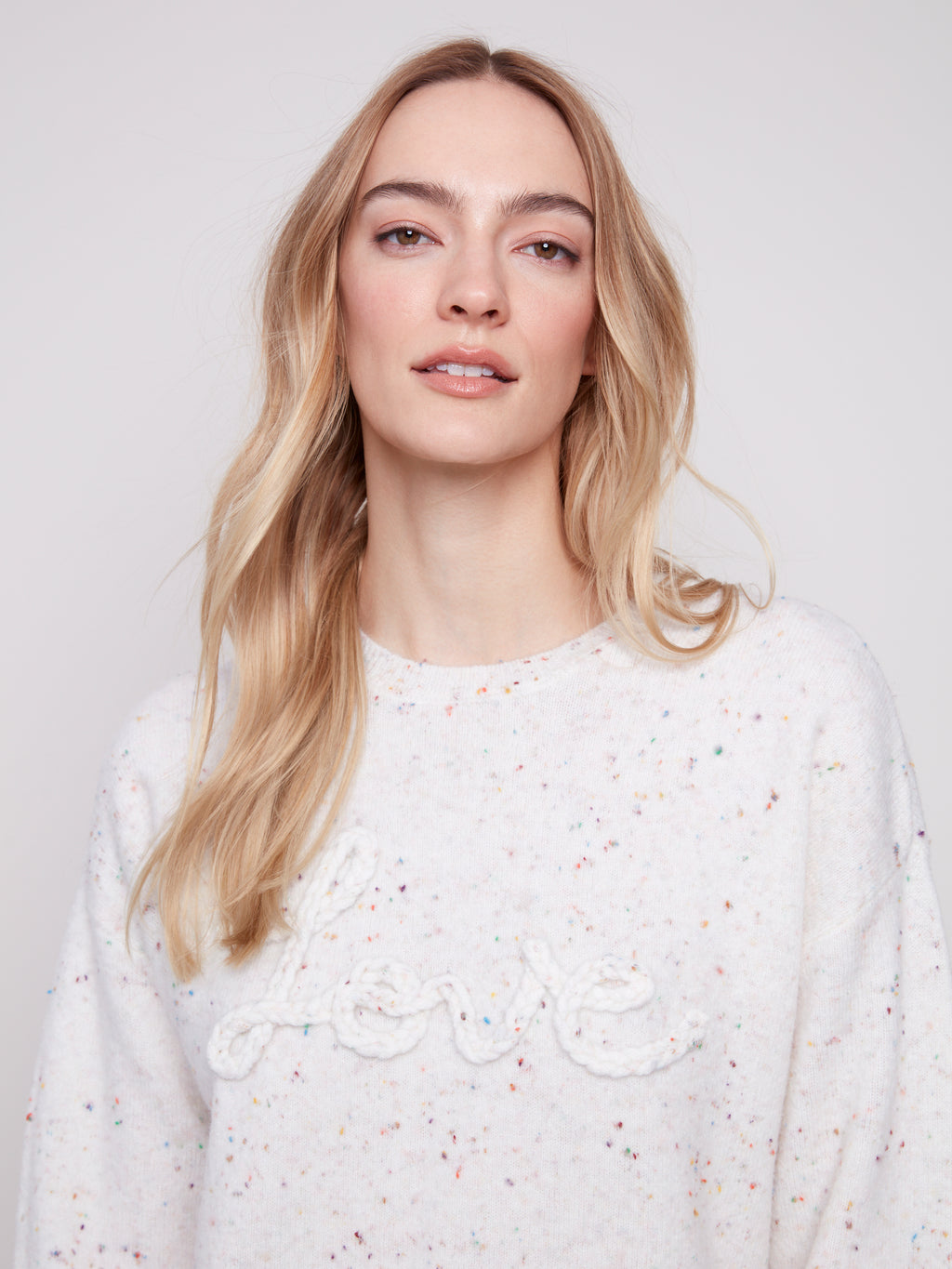 Jaboli Boutique | Fergus Ontario |Charlie B | Crew "Love" Sweater

Crew Neck

Colour - Ecru with Confetti Dot Accent

Braided "Love" applique

Long Sleeves

47% Polyester,45% Acrylic, 5% wool, 3% Spandex