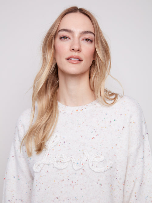 Jaboli Boutique | Fergus Ontario |Charlie B | Crew "Love" Sweater

Crew Neck

Colour - Ecru with Confetti Dot Accent

Braided "Love" applique

Long Sleeves

47% Polyester,45% Acrylic, 5% wool, 3% Spandex