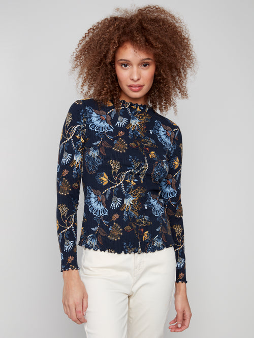 Jaboli Boutique | Fergus Ontario | Charlie B | Mock Neck Floral Print Top

Lettuce Hems at Neck, Hem and Cuffs

Colour - Rio, Rio

Super Soft and Stretchy

Dark Navy with Gold and Blue Print

Viscose/Spandex Blend