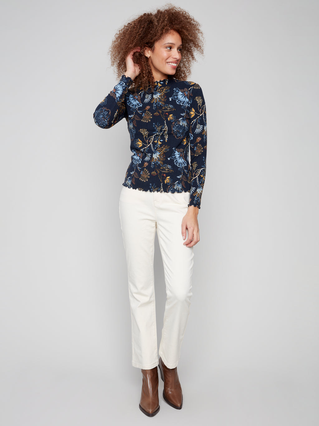 Jaboli Boutique | Fergus Ontario | Charlie B | Mock Neck Floral Print Top

Lettuce Hems at Neck, Hem and Cuffs

Colour - Rio, Rio

Super Soft and Stretchy

Dark Navy with Gold and Blue Print

Viscose/Spandex Blend