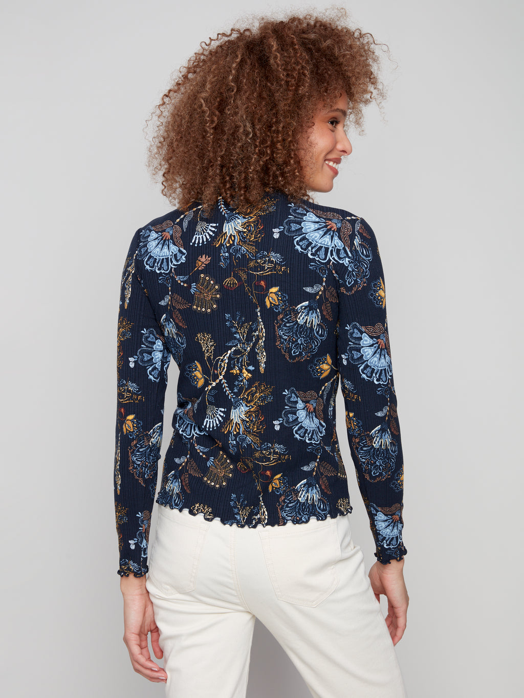 Jaboli Boutique | Fergus Ontario | Charlie B | Mock Neck Floral Print Top

Lettuce Hems at Neck, Hem and Cuffs

Colour - Rio, Rio

Super Soft and Stretchy

Dark Navy with Gold and Blue Print

Viscose/Spandex Blend