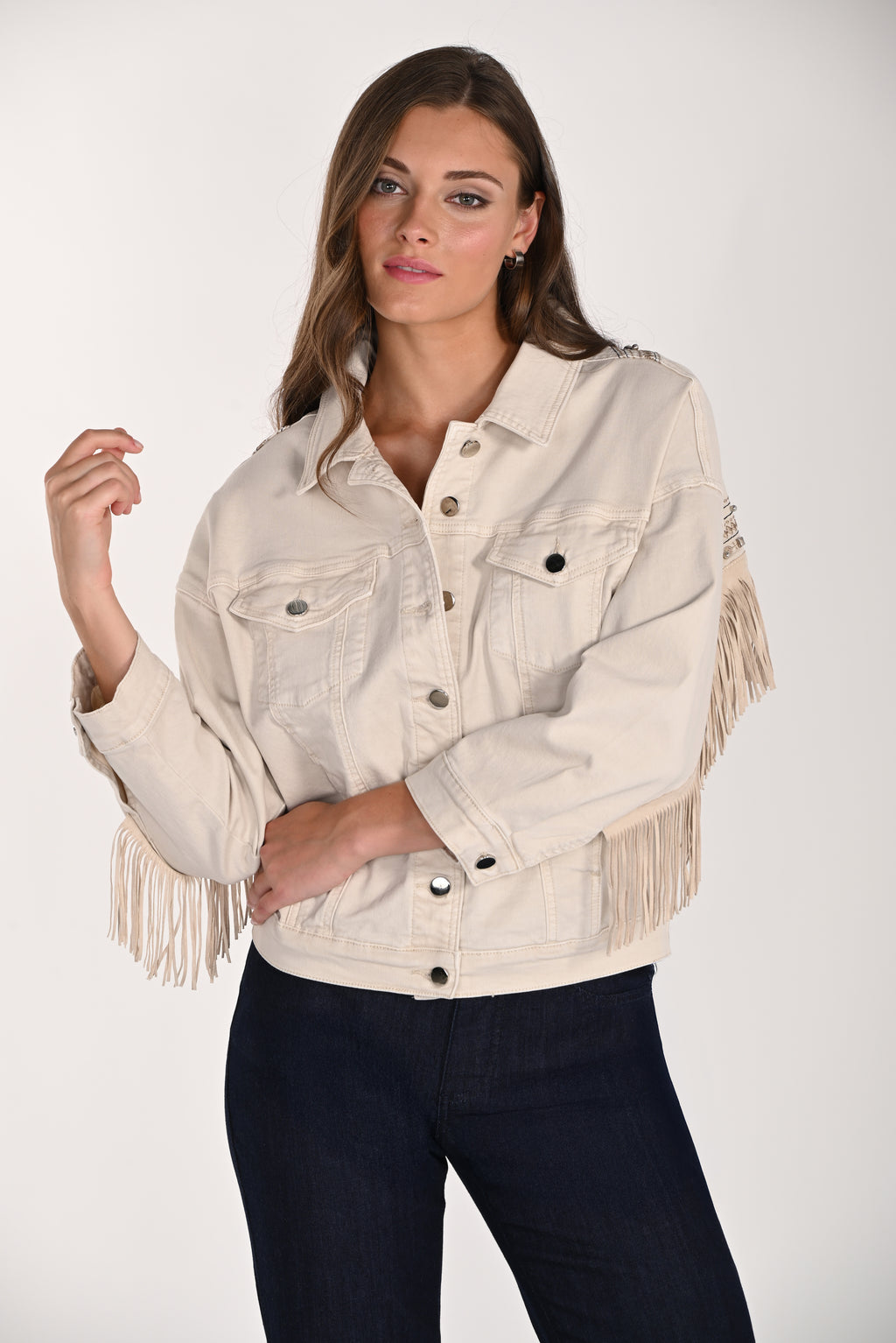 Jaboli Boutique|Fergus Ontario|Frank Lyman|Cowgirl Jacket-261605
Beige Jean Jacket with a Western Flair
Fringe across the Back and Down Each Arm, Silver Studded Accent Across The Back with Embroidered Motif, button front, collar,4 Pockets